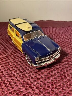 Ford Blue and Yellow Die-Cast Woody Wagon with Surfboard